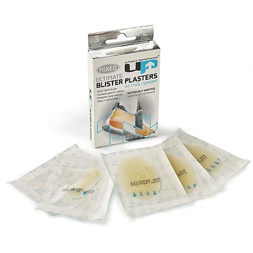 The packaging and individual wraps of "Ultimate Performance Blister Plaster Mixed Pack," crafted for active sports use, are set against a white background. The open box features a foot illustration to indicate faster healing, with several plaster sheets arranged in front, ensuring effective pain relief.
