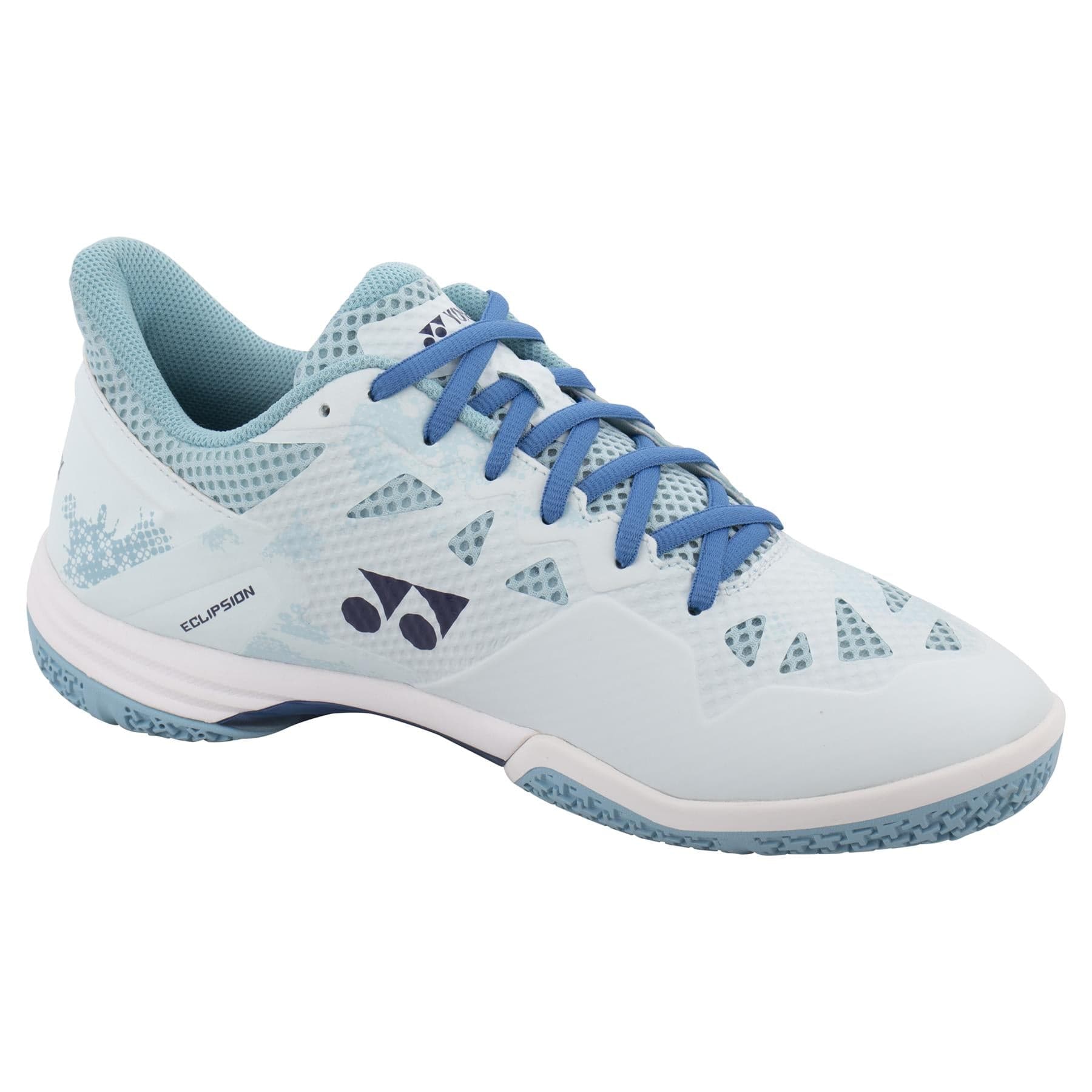 Introducing the Yonex Power Cushion Eclipsion Z3 Wide Men's Badminton Shoes in light blue, featuring Power Cushion tech. With darker blue laces, a textured sole for grip, a white midsole, and a sleek pattern with a side logo, these indoor sports shoes offer unmatched stability.