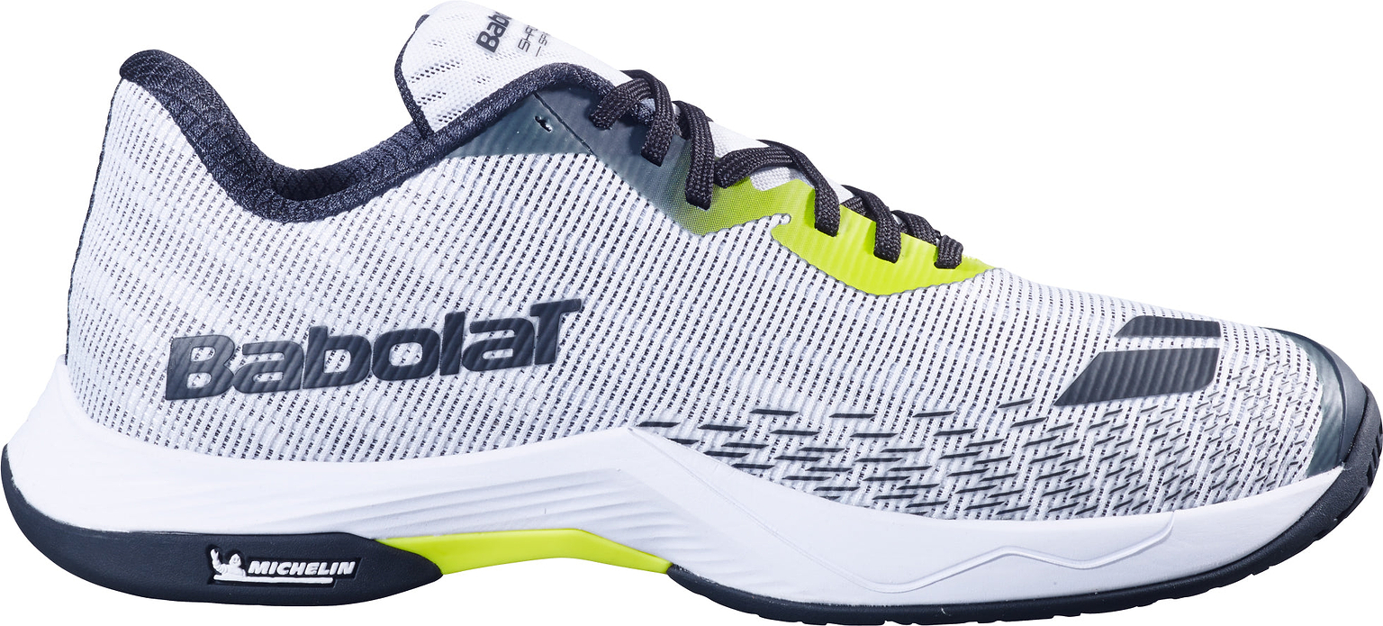 The Babolat Shadow Spirit 2 Men's Badminton Shoes in White/Lime feature a stylish white and gray design with black, gray, and lime accents. Crafted for peak performance, these shoes include a Michelin outsole with its distinctive logo on the black-and-white sole, Comfort Soft cushioning and laces for added comfort, and a breathable mesh upper to enhance airflow.
