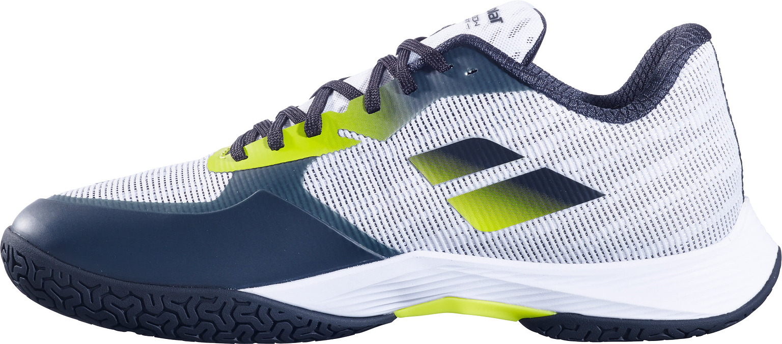 Introducing the Babolat Shadow Spirit 2 Men's Badminton Shoes in White/Lime: a white athletic sneaker by Babolat with striking black, lime yellow, and dark blue accents. This modern shoe features a breathable mesh upper, durable textured Michelin outsole, and black laces. Its sleek design includes stylish cut-out side details that add both flair and enhanced durability for serious play.
