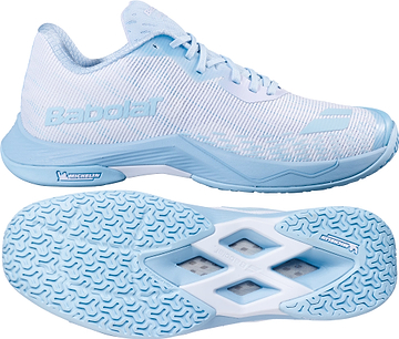 The Babolat Shadow Spirit 2 Womens Badminton Shoes in White and Blue are displayed from side and bottom angles, highlighting the textured Michelin outsole, breathable mesh upper, and prominent "Babolat" branding on the side and outsole for enhanced comfort and cushioning during play.