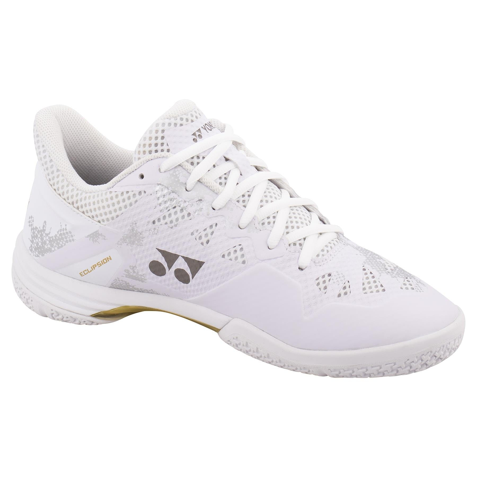 The Yonex Power Cushion Eclipsion Z3 men's badminton shoe in white with gold accents features a patterned design, Power Cushion technology for enhanced cushioning, white laces, a slightly raised heel, side branding, and a grip sole suitable for sports.