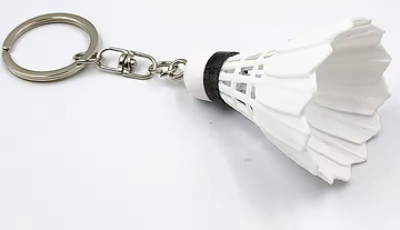 The BadmintonHQ Badminton Shuttlecock Keyring - White features a mini white shuttlecock with a black band, attached to a keyring by a small chain—perfect for any badminton enthusiast.