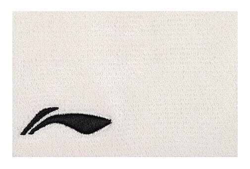 A white towel with a textured surface has a small black embroidered logo of a stylized shoe or wing in the lower left corner, similar to the sleek design of the Li-Ning Corner Logo Wristband - White by Li-Ning.