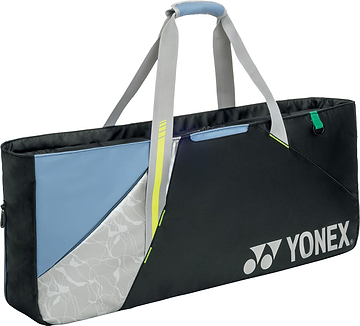 The Yonex BA52531EX Club Tournament Badminton Bag in black and blue features a floral pattern, gray handles, and the Yonex logo on the front—a stylish and durable bag for badminton players.
