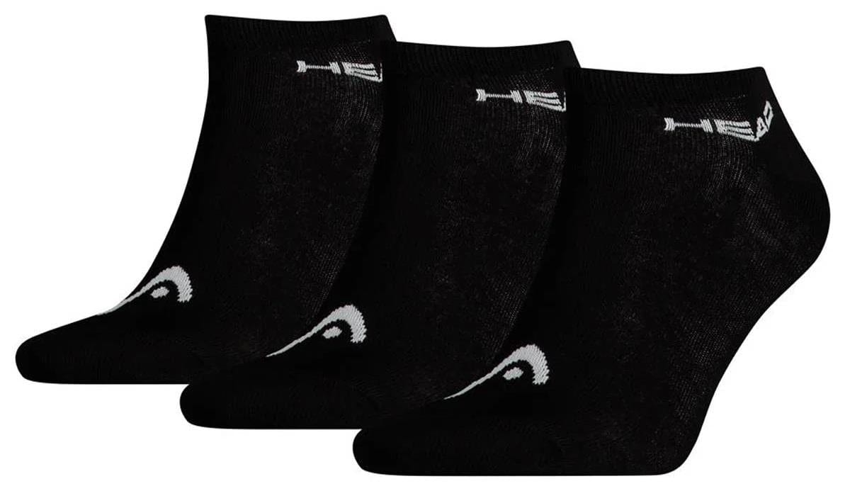 The HEAD Sneaker Badminton Socks (3 Pack) in black are made from a soft cotton blend. Each sock features a white logo and text near the top edge and a small design by the toe, providing comfort and style for casual wear.