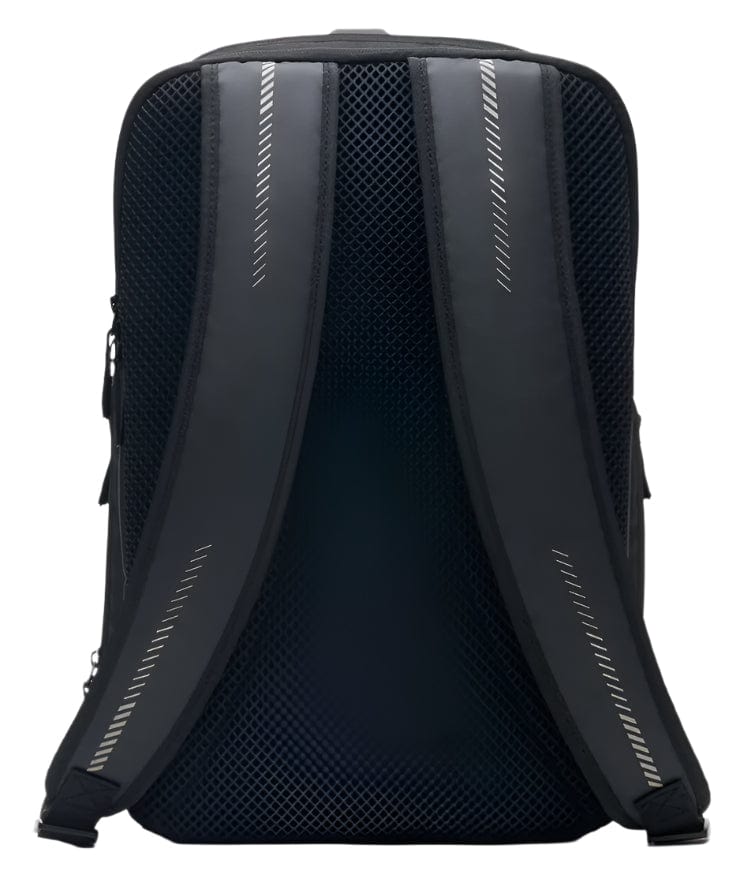 The image displays the Kanso Intuko Badminton 23L Backpack in black, featuring padded shoulder straps with reflective strips and a breathable mesh back panel, ensuring comfort for everyday use.