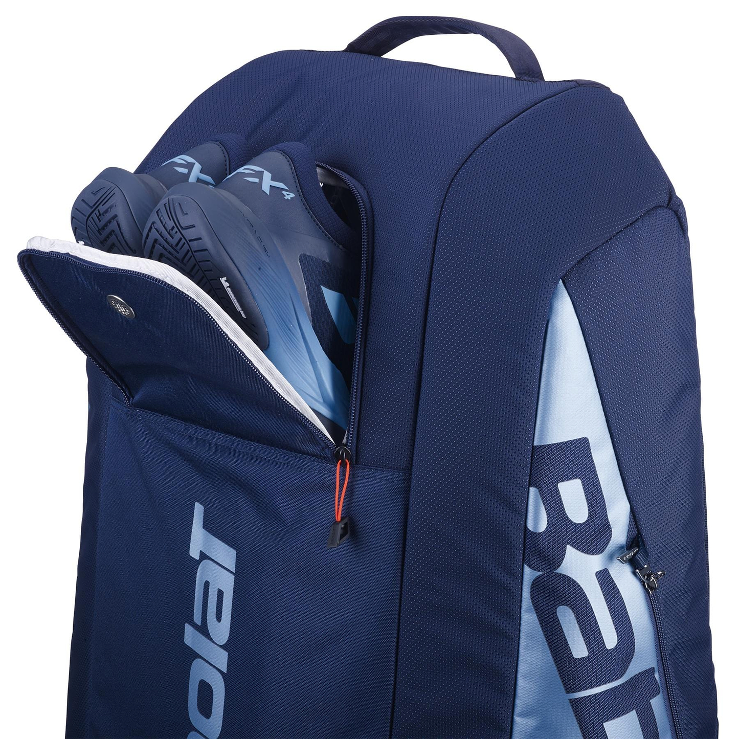 The Babolat RH12 Pure Drive Gen11 12 Racket Badminton Bag in navy blue sports a bold "Babolat" logo, with a partially open zippered compartment showcasing blue and black shoes. Designed for versatility, it has a top handle and can store badminton rackets.