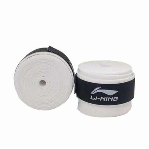 The image displays two rolls of the Li-Ning Badminton Overgrip in white. One roll is positioned upright while the other lies flat. The overgrips incorporate absorbent grip technology and are held together with black straps showcasing the Li-Ning logo, ensuring they maintain their tackiness for peak performance.