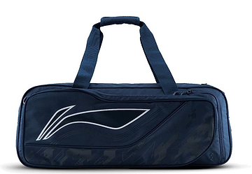 The Li-Ning Team 6 Racket Badminton Bag in navy blue features a black and white abstract side design, two handles, and a zippered main compartment—ideal for carrying up to 6 rackets for matches or practice.