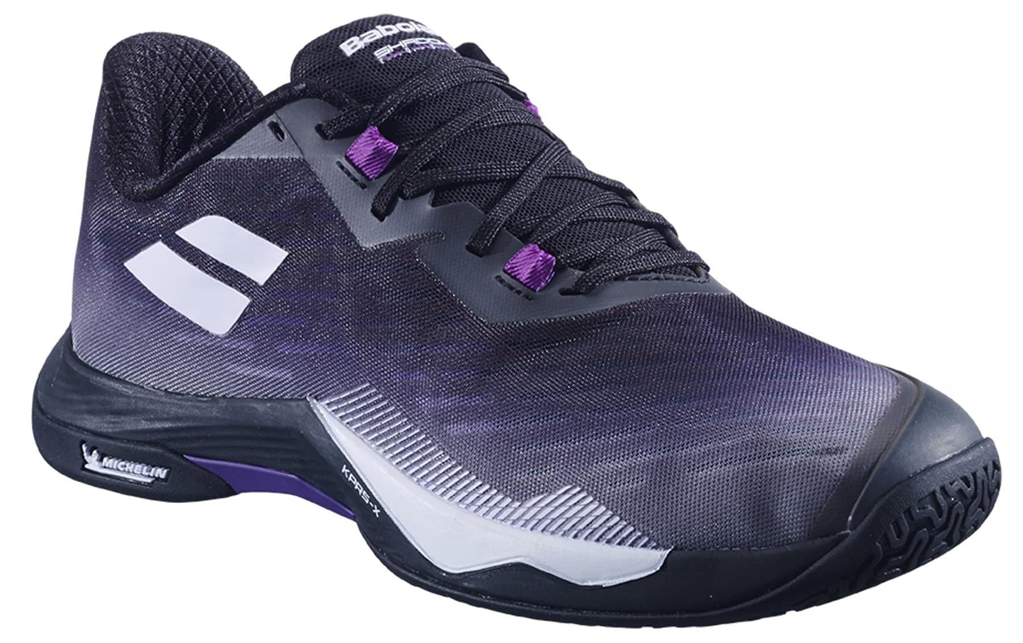 The Babolat Shadow Tour 5 Mens Badminton Shoes in black and purple feature white accents, black laces, a textured sole, branding on the tongue and side, and a Michelin logo near the heel—ideal for indoor court play.