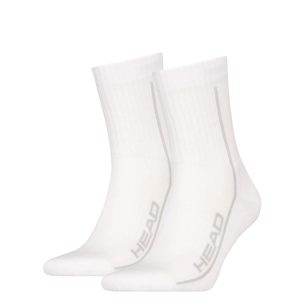 The HEAD Performance Short Crew Badminton Socks (2 Pack) in white feature ribbed cuffs, arch support, and the "HEAD" brand name in gray on the sides. They stand upright against a white background, promising shock absorption during play.