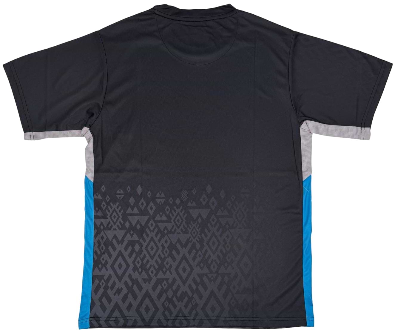 The Yonex YTM11 Mens Badminton T-Shirt in black features gray geometric patterns on the lower back and blue-gray side panels. Made with Air-Release fabric for cool, quick-dry comfort. Shown laid flat, back facing up. Brand: Yonex.
