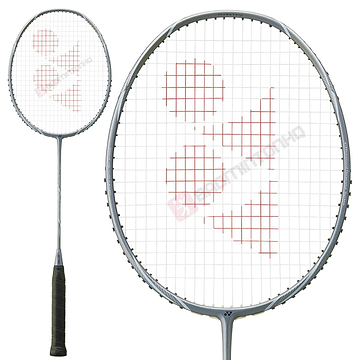 The Yonex Astrox Nextage 4U Badminton Racket in Light Grey includes a black handle and silver frame with strings that feature a red geometric logo, ideal for intermediate players. The image shows the full racket and a close-up of its head.