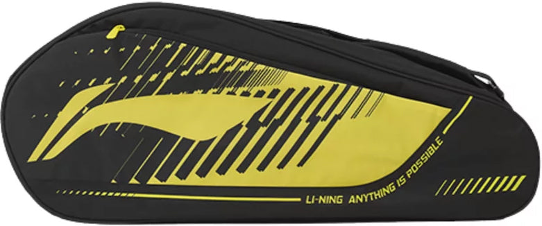 The Li-Ning Training Series 3 Racket Badminton Bag in black and yellow showcases a bold graphic design with “ANYTHING IS POSSIBLE” printed on the side. This stylish bag from Li-Ning is perfect for carrying your gear to every match or practice.