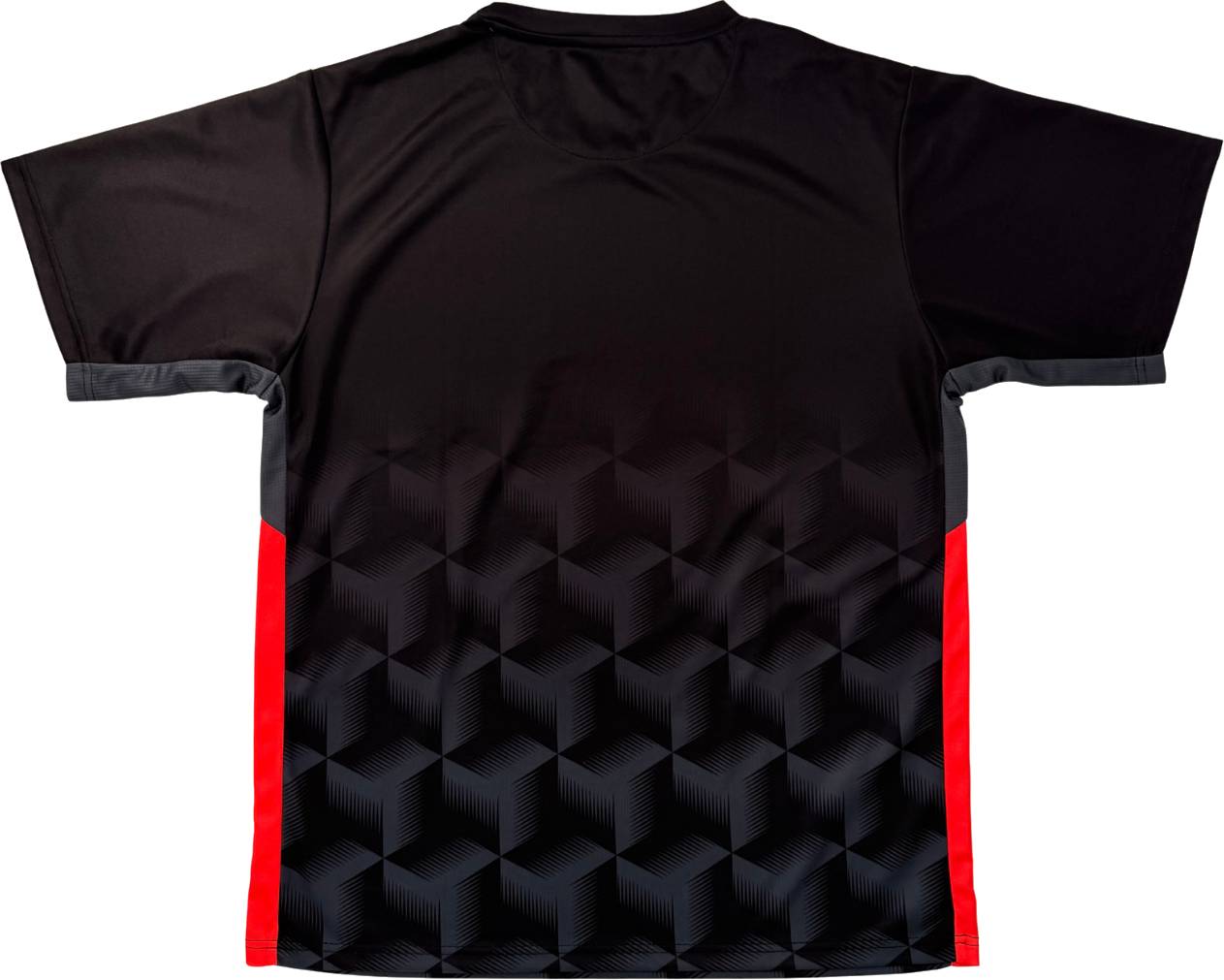 The Yonex YTM12 Men’s Badminton T-Shirt in black features a geometric cube pattern on the lower back and bold red side panels. Shown laid flat, the shirt highlights the distinctive back design and stylish Yonex team apparel branding.