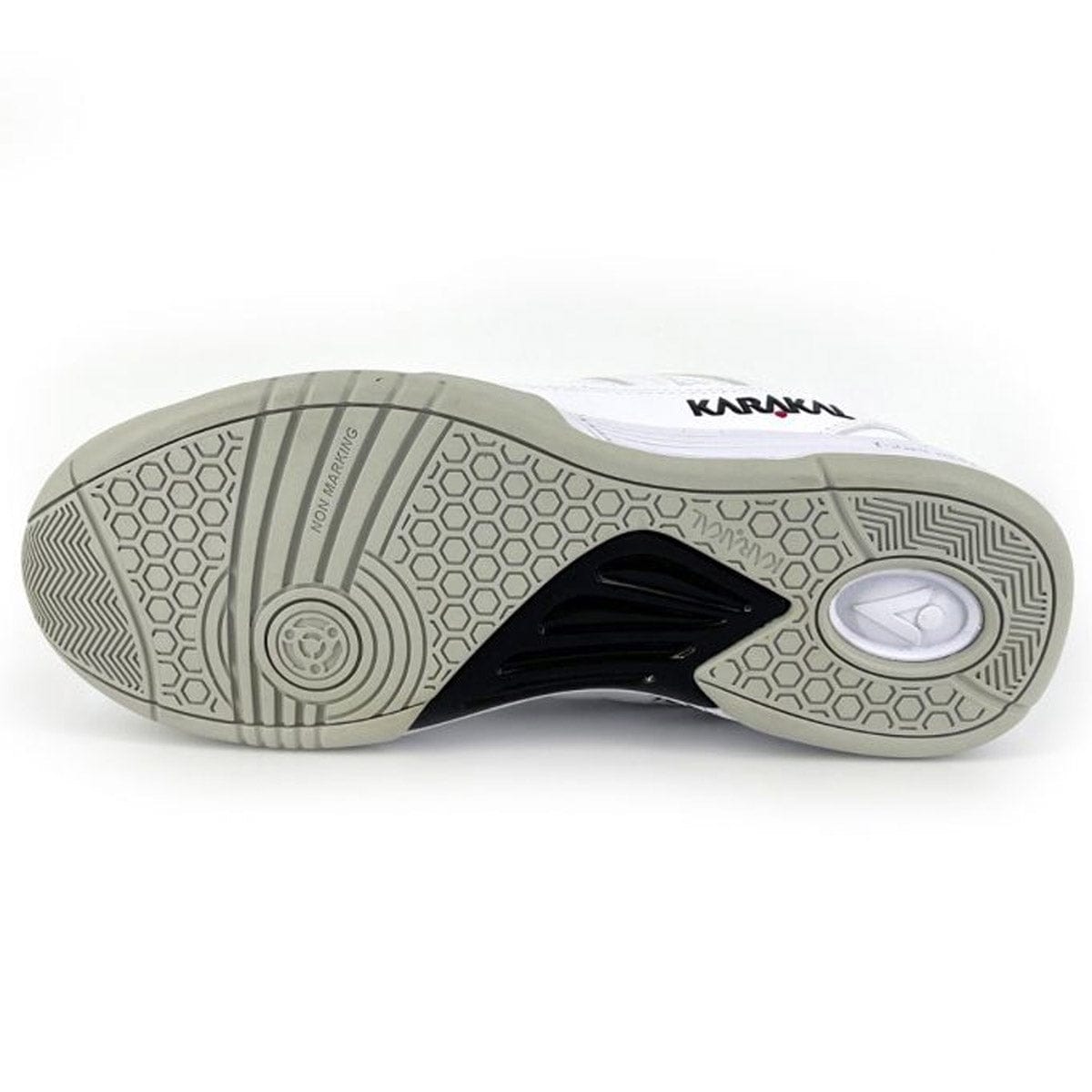 The Karakal KF Pro Lite Badminton Shoes from Karakal feature a multi-textured sole with hexagonal patterns and a circular grip area to enhance lateral stability. These stylish shoes come in a sleek combination of light grey, black, and white, and include a shock-absorbing gel insole for maximum comfort.
