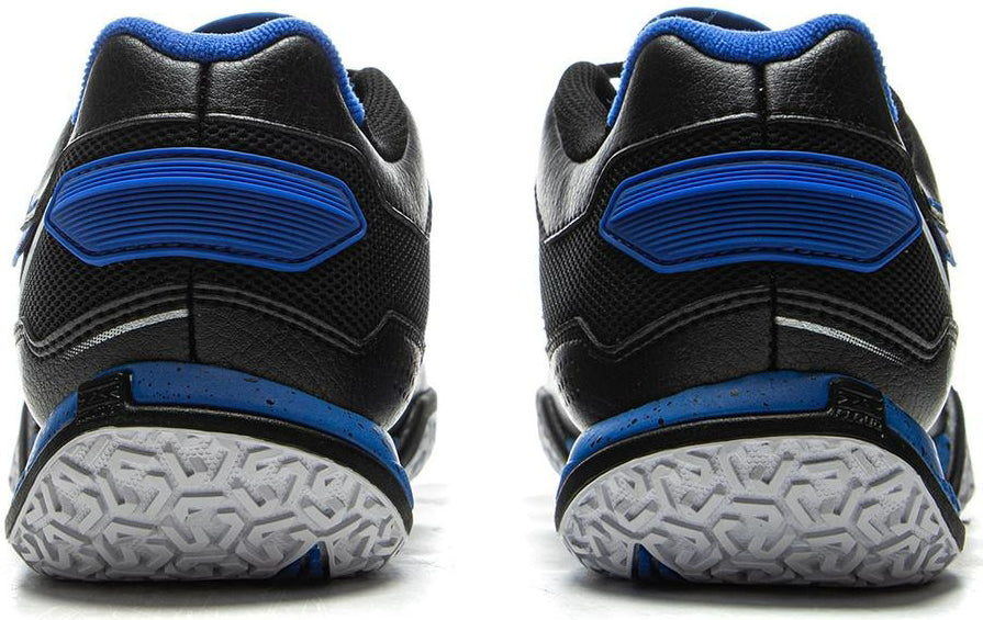 The image shows the back view of Li-Ning Saga III Lite Men's Badminton Shoes in black with blue accents and textured white soles, featuring Li-Ning Cloud cushioning, placed side by side on a white background.