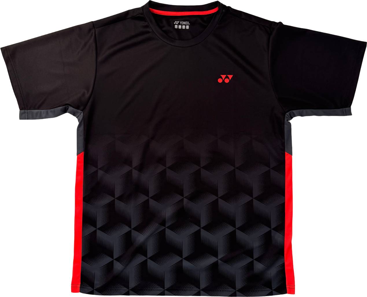 Introducing the Yonex YTM12 Men’s Badminton T-Shirt in black, featuring a stylish geometric cube pattern, striking red side panels, and a subtle red Yonex logo on the left chest—ideal for fans of premium Yonex team apparel.