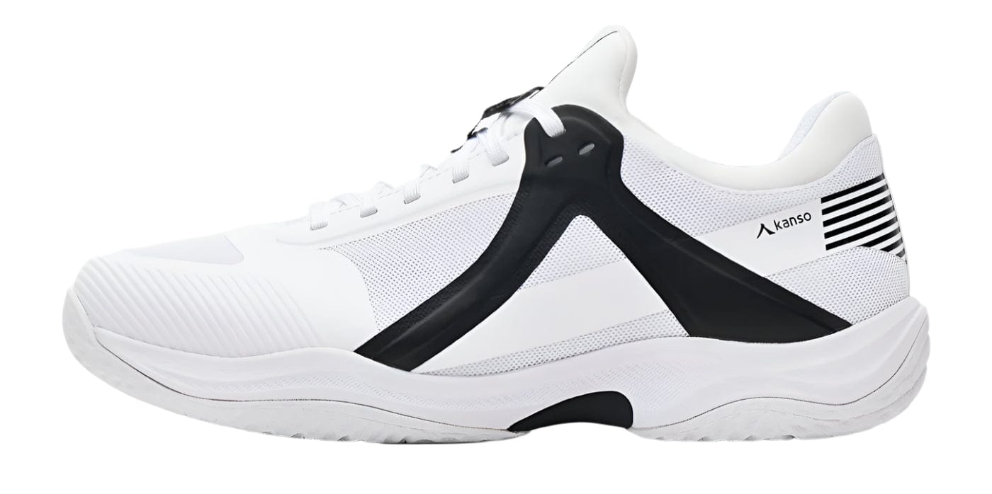 The Kanso Equilibrium EQx3 Unisex Badminton Shoes in white feature a sleek black geometric design, a Speedlight Foam textured sole for superior shock absorption, stripe detailing on the heel, and a lace-up front for a modern look.