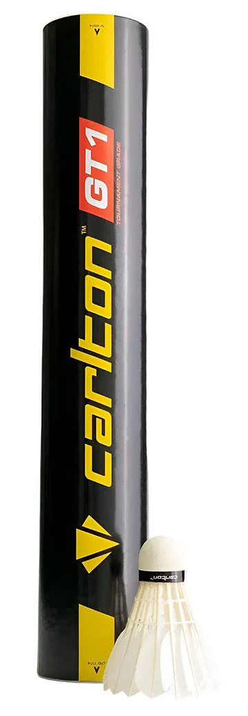 A black Carlton GT1 tube with yellow and red text stands upright beside a white feather shuttlecock. The set of 12 Carlton GT1 Badminton Feather Shuttles is ideal for pro players seeking tournament-grade quality.