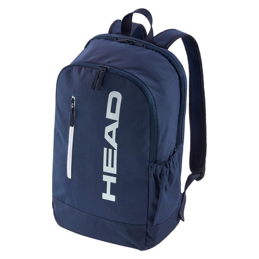 The HEAD BASE Badminton Backpack 17L - Navy features a front zipper pocket, two side pockets, a top handle, padded shoulder straps, updated design, and a vertical white HEAD logo on the front.