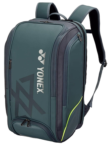 The Yonex 02512 Viktor Axelsen VA Expert Badminton Backpack in steel grey features multiple zippered compartments, side pockets, padded shoulder straps, and the Yonex logo. Perfect as a tournament badminton bag.