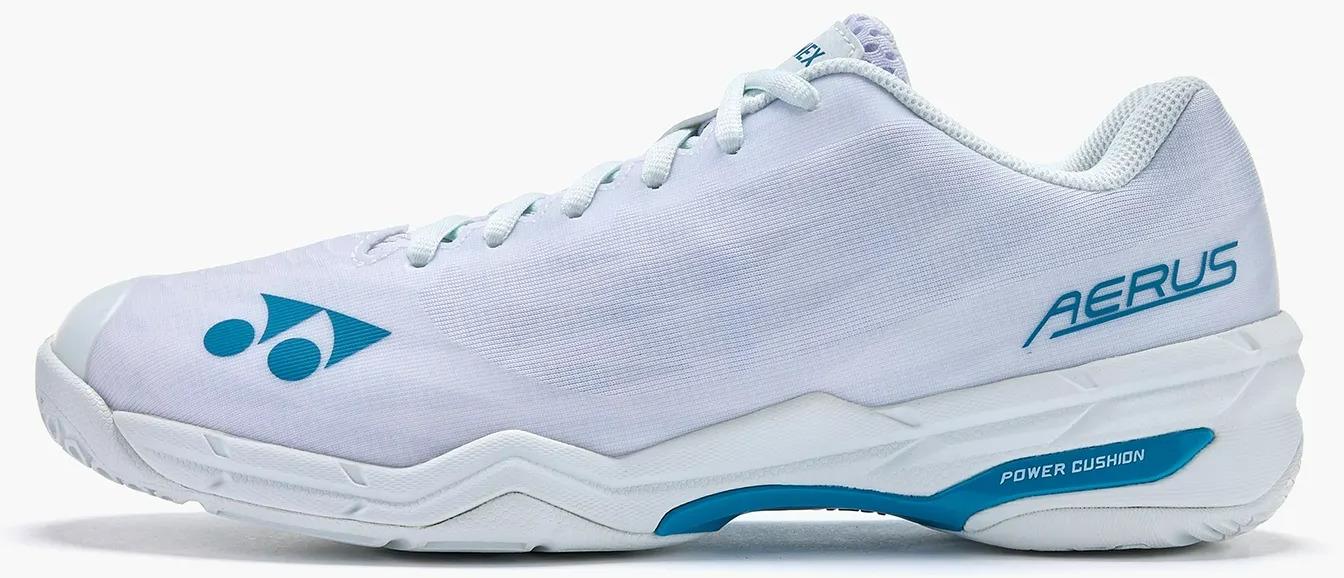 The Yonex Power Cushion Aerus X2 Unisex Badminton Shoes in white/blue feature a lightweight design, blue logo, “AERUS” on the side, white laces, and a textured sole—ideal for agile indoor court play.