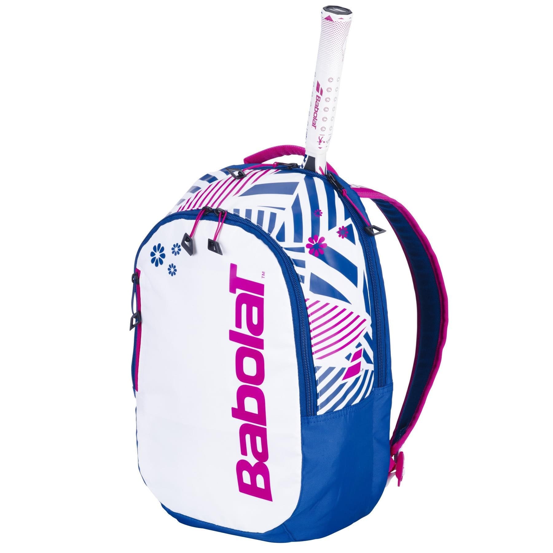The Babolat Kids Badminton Backpack in blue, white, and pink features geometric and floral patterns, is crafted from recycled materials, and doubles as a tennis racquet bag with a handle slot.