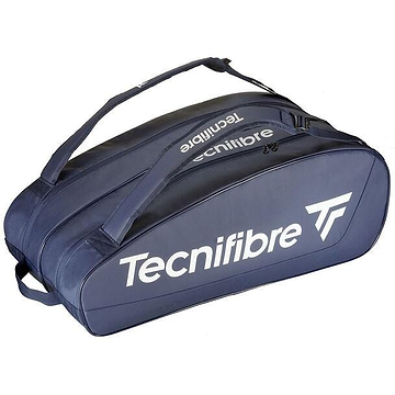 The Tecnifibre Tour Endurance 2023 12 Racket Badminton Bag in navy blue, made from durable tarpaulin fabric, offers a spacious zippered main compartment and an adjustable shoulder strap. The bold white Tecnifibre brand name along the side ensures both style and functionality.