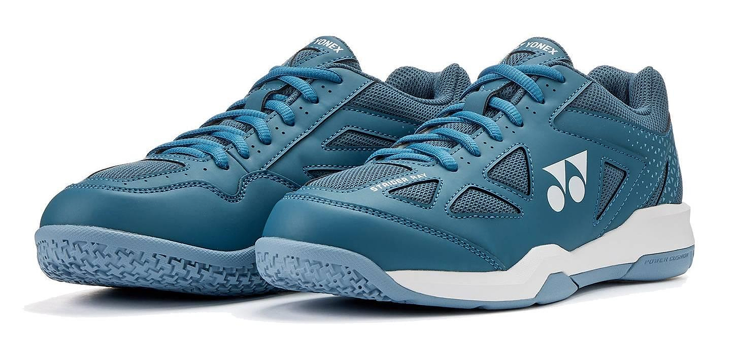 Experience superior comfort on the court with Yonex Power Cushion Strider Ray Unisex Badminton Shoes in Teal Blue, featuring advanced shock absorption like other top Yonex models.