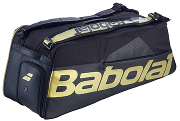 The Babolat Cross Pro Badminton Bag - Black / Gold features a thermoformed shell, multiple zippered compartments, and the Babolat logo on the side.