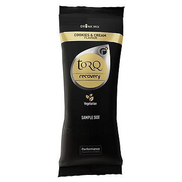 A 50g sachet of Torq Recovery drink mix in cookies and cream flavor features elegant black packaging with a gold and silver logo, emphasizing its post-exercise nutrition benefits and clearly marked as vegetarian.