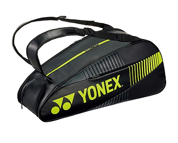 The Yonex 82426EX Active 6 Racket Badminton Bag in Black/Lime has shoulder straps and multiple compartments, including one for shoes, making it ideal for carrying rackets and sports gear.