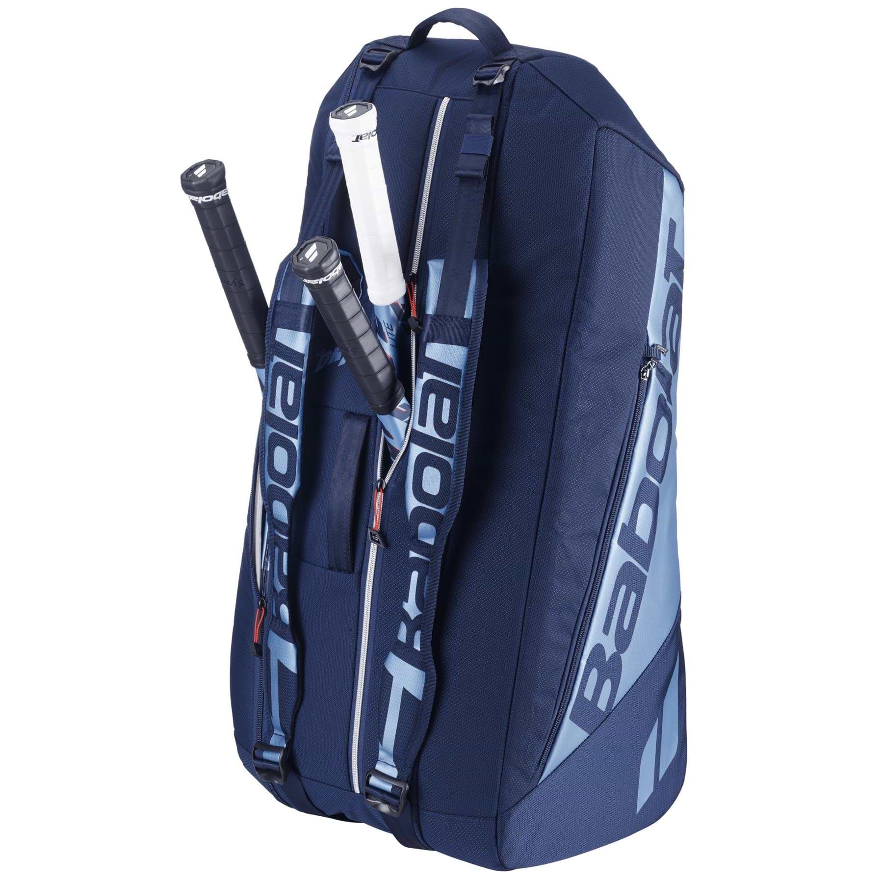The navy blue Babolat RH6 Pure Drive Gen11 bag, made from recycled polyester and showcasing the brand logo, offers multiple compartments. It holds three rackets with black and white grips in the exterior pocket, has adjustable straps, and a top carry handle for convenience.