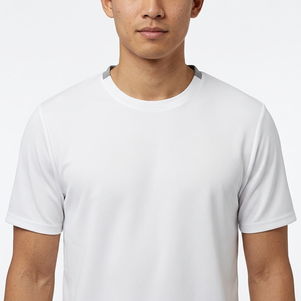 A man wears the HEAD Simple Mens Badminton T-Shirt - White by HEAD, standing chest-up against a white background with his face partially visible.