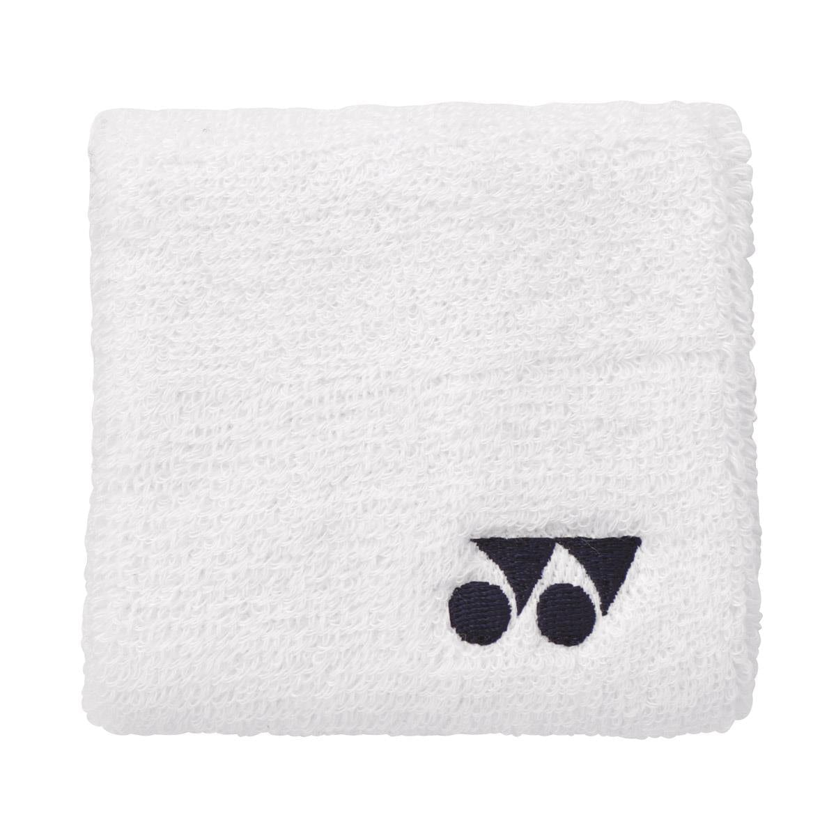 The Yonex AC493 Wristband in white is designed for on-court performance with a textured surface and features a small black logo that includes two dots and a triangle.