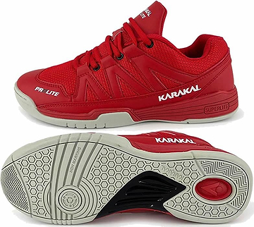 The Karakal KF Pro Lite Badminton Shoes in New Red are designed for superior lateral stability. Featuring a mesh and synthetic upper with a lace-up closure, these shoes have a light gray sole with a honeycomb pattern and circular grip details. Enhanced comfort comes from the shock-absorbing gel insole.