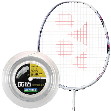 A badminton racket with a red logo on the strings stands beside a spool of Yonex BG 65 Ti Badminton String in white. The spool label emphasizes its long durability, owed to high-quality nylon fibers and a multifilament core for enhanced performance.