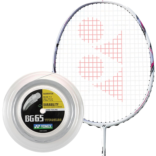 A badminton racket with a red logo on the strings stands beside a spool of Yonex BG 65 Ti Badminton String in white. The spool label emphasizes its long durability, owed to high-quality nylon fibers and a multifilament core for enhanced performance.