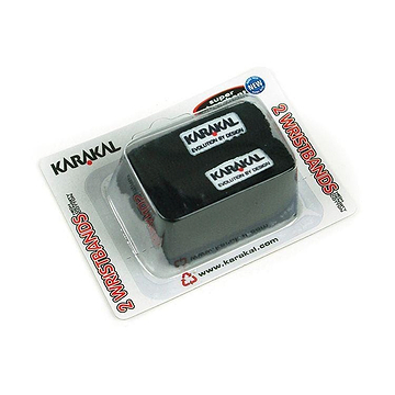 The packaging displays a twin pack of black Karakal wristbands, ideal for badminton fans. Made from super absorbent cotton, the white packaging includes bold red text stating "2 Wristbands.