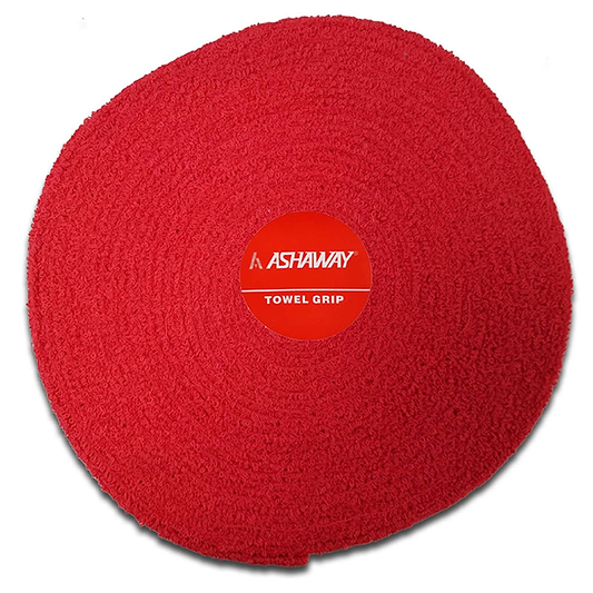 A red circular towel grip for racquets from Ashaway, featuring a textured, self-adhesive surface. The center displays a red label with "Ashaway Badminton Towel Grip Roll" written in white text, emphasizing its absorbent qualities to enhance your game.