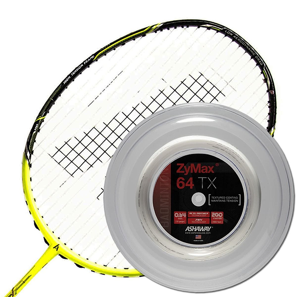 A yellow and black badminton racket rests next to a spool of Ashaway Zymax 64 TX White badminton string, measuring 0.64mm in diameter and spanning 200 meters. The transparent reel is adorned with a red and black label, highlighting the use of advanced BETA polymer fibers for improved performance through its ZyWeave string technology.
