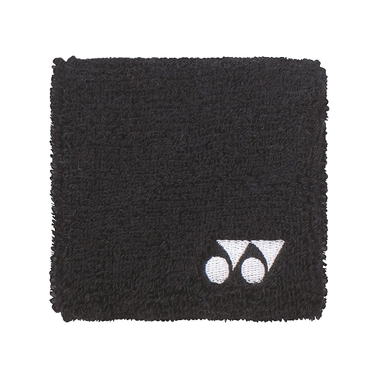 The Yonex AC493 Wristband in black is ideal for on-court activities, showcasing a small white logo in the corner against a plain white backdrop. Its soft and absorbent texture makes it the perfect sports accessory.
