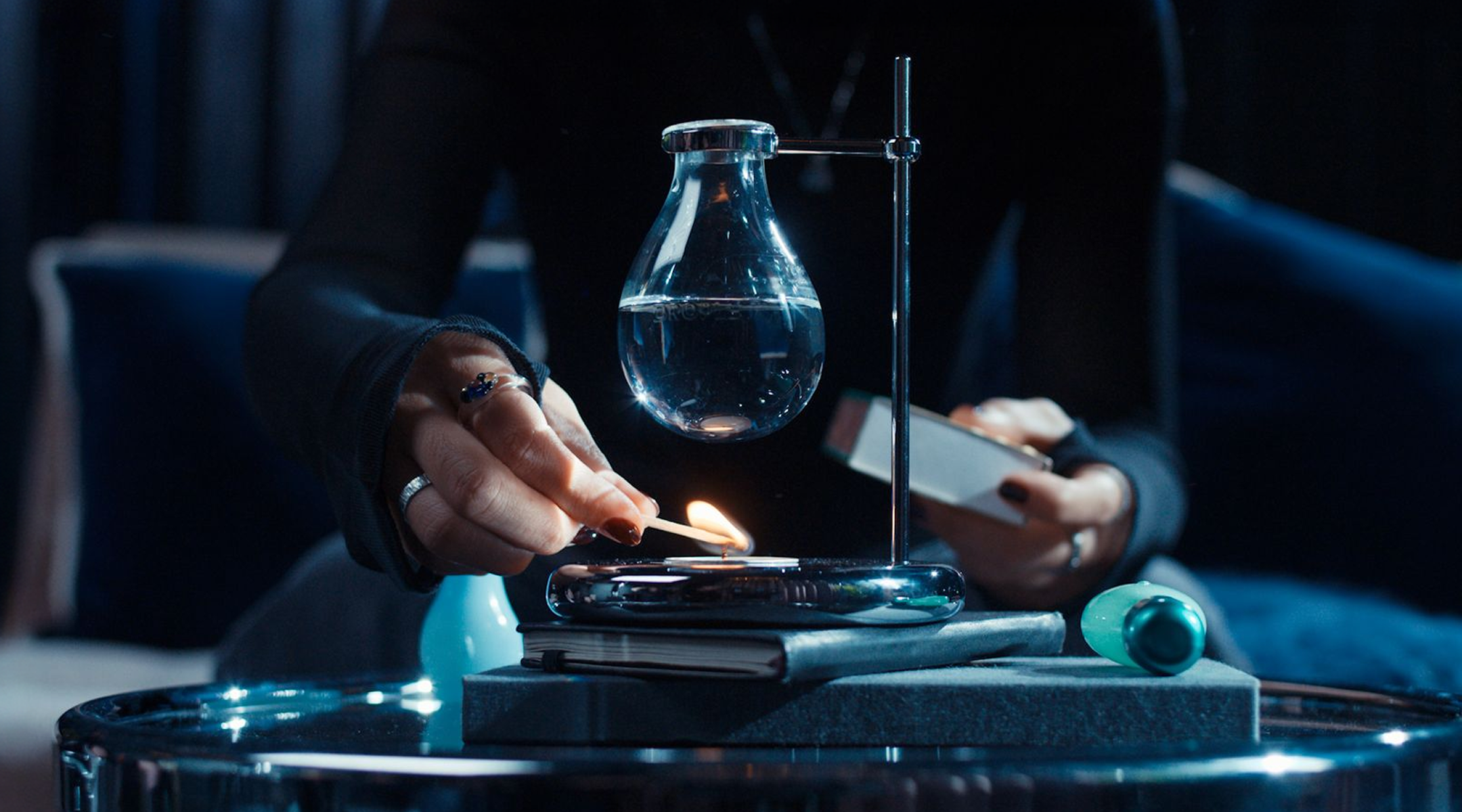 Lighting the tealight under the Droplet Scent Burner