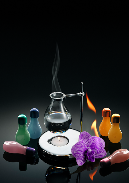 The Droplet Scent Burner with a lit tealight