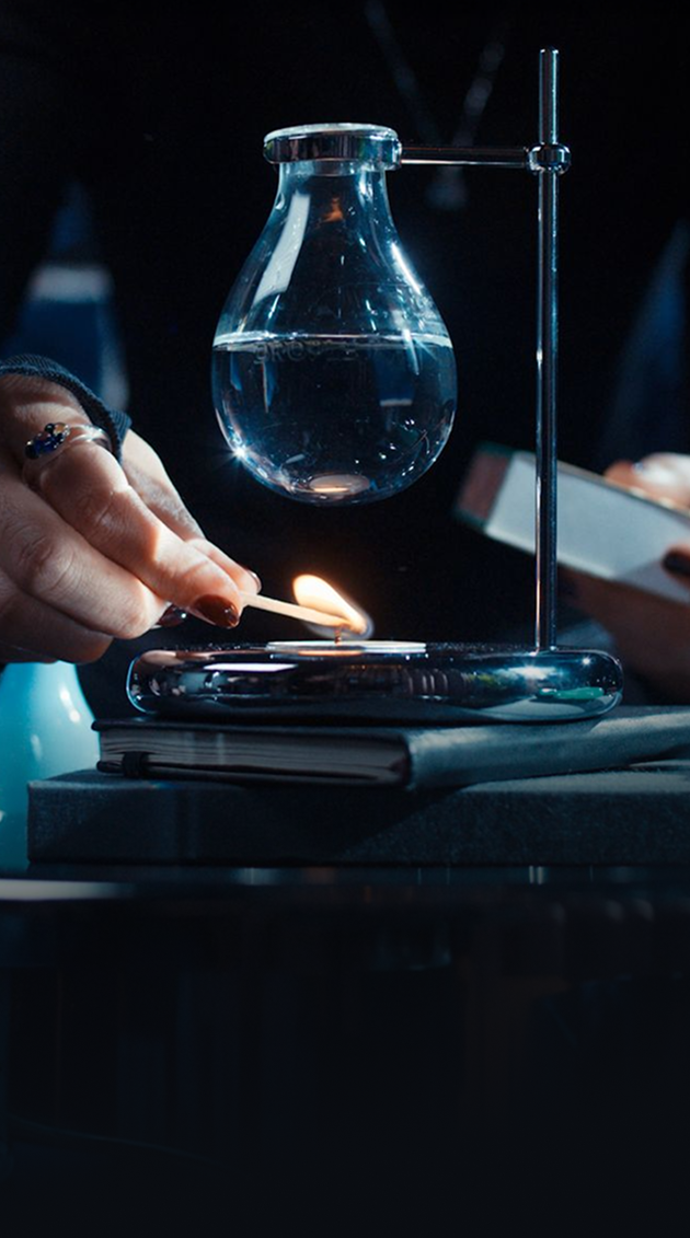 Lighting the tealight under the Droplet Scent Burner