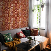 Uzbek wallpaper in Clay by Coordonne — interior