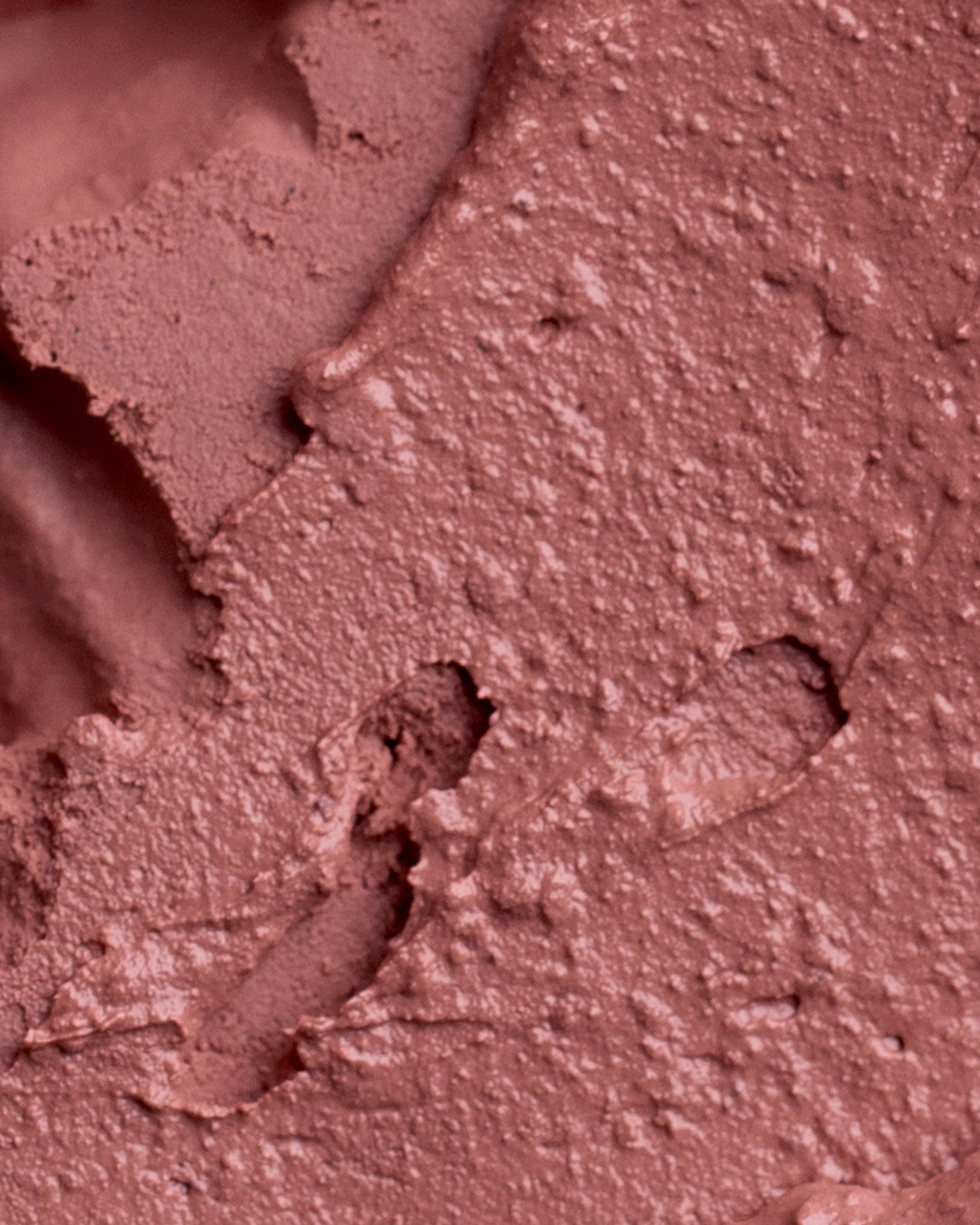 Texture close-up of MÁDARA Organic Skincare satin shine lipstick flattery A6501 swatch demonstrates consistency and finish.