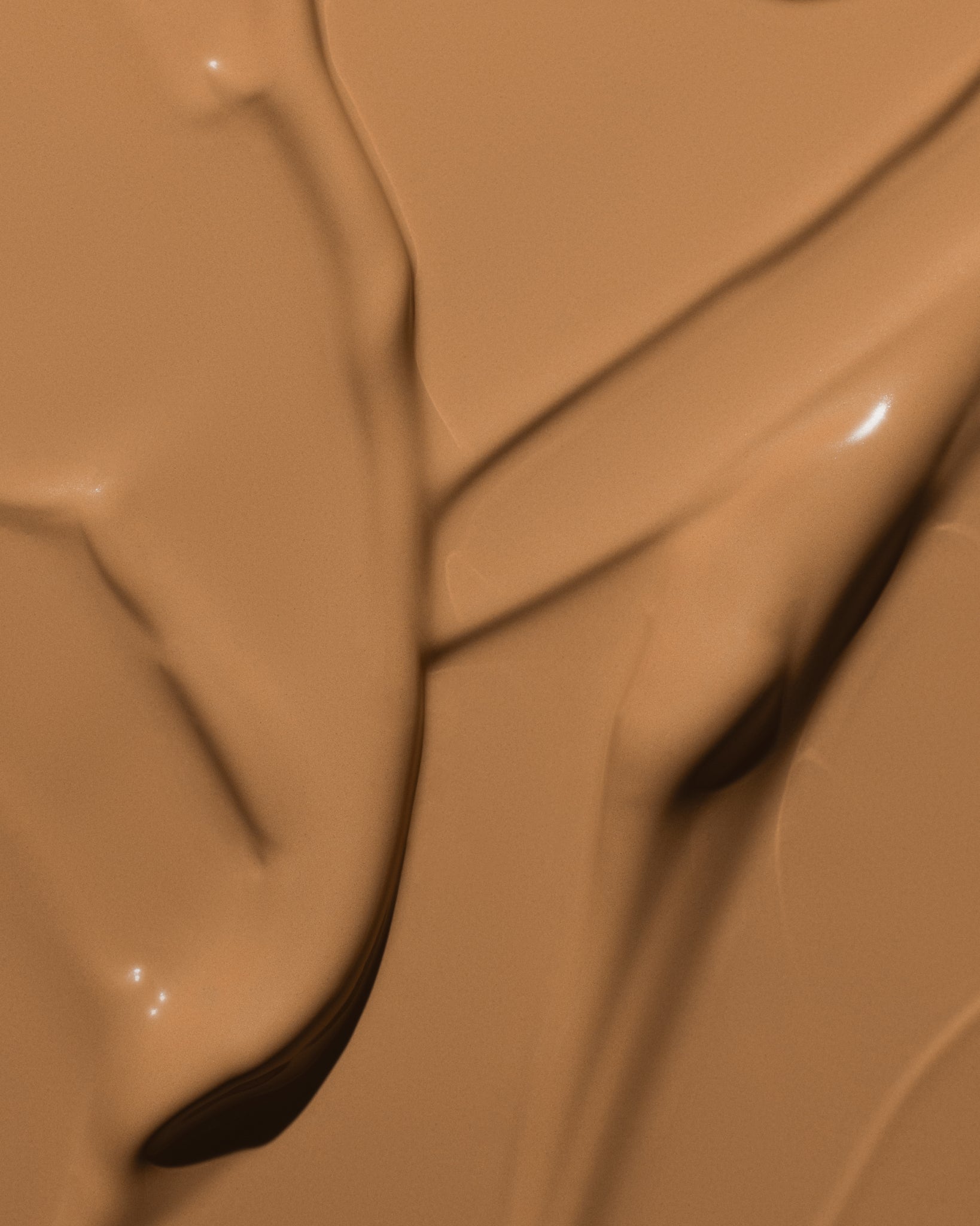 Texture close-up of MÁDARA Organic Skincare skinonym olive A6091 �swatch demonstrates consistency and finish.